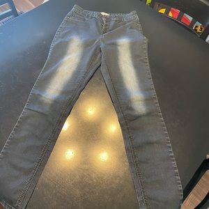 Black button fly jeans